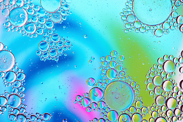 Image showing Colorful abstract background with oil drops on water