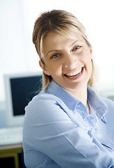 Image showing young female in front of computer