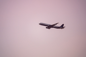 Image showing plane sunset haze