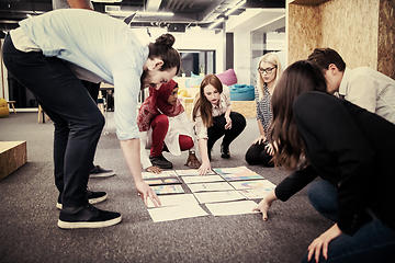 Image showing black muslim woman having meeting with Multiethnic  startup busi