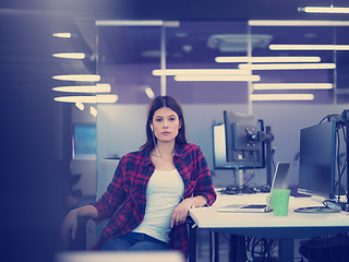 Image showing female software developer using laptop computer