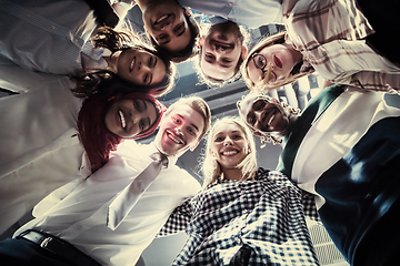 Image showing multiethnic Group of young business people celebrating success