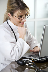 Image showing female doctor in her office