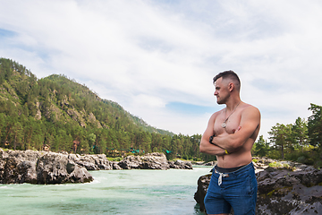 Image showing Man resting at river