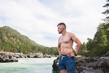 Image showing Man resting at river