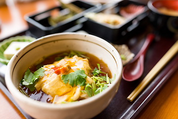 Image showing Japanese tofu soup bowl in restaurant