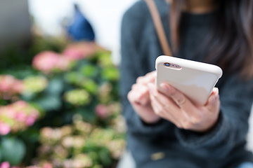 Image showing Woman use of cellphone at outdoor