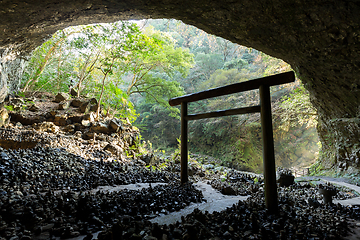 Image showing Shinto shrine gateway in the cave