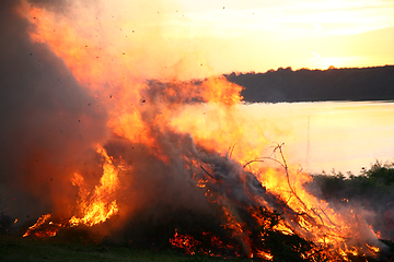 Image showing Outdoor fire nearby a lake in the summer in Denmark