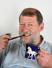 Image showing Mature scandinavian man driking coffee