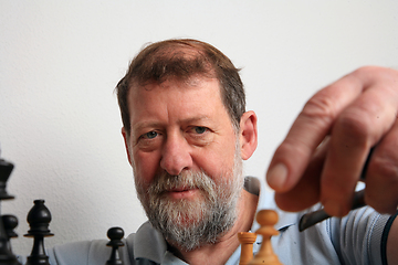 Image showing Mature scandinavian man playing chess