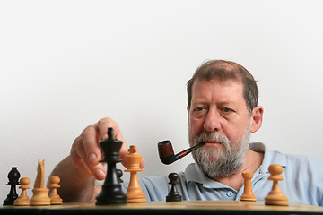 Image showing Mature scandinavian man playing chess