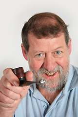 Image showing Mature scandinavian man smoking  pipe