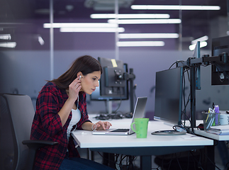 Image showing female software developer using laptop computer