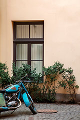 Image showing Motorcycle next window in Riga town.