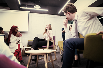 Image showing Multiethnic startup business team having meeting