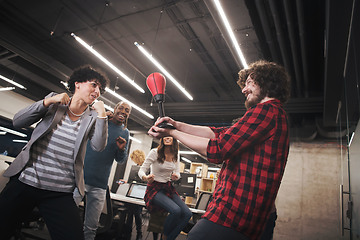 Image showing multiethnics business team boxing at office