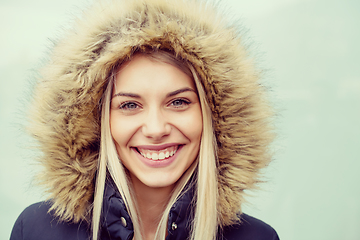 Image showing portrait of young blonde girl wearing winter jacket