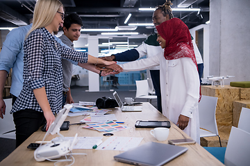 Image showing multiethnic Group of young business people celebrating success