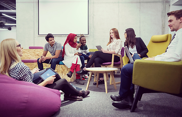 Image showing Multiethnic startup business team having meeting