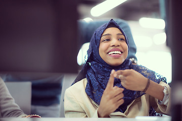 Image showing black muslim female software developer at work