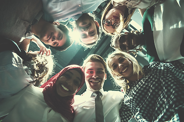 Image showing multiethnic Group of young business people celebrating success