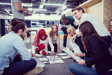 Image showing black muslim woman having meeting with Multiethnic  startup busi