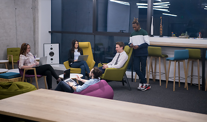 Image showing Multiethnic startup business team having meeting