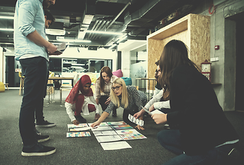 Image showing black muslim woman having meeting with Multiethnic  startup busi