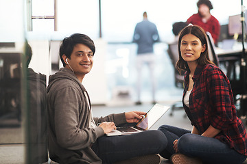 Image showing software developers couple working on the floor