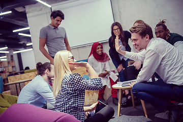 Image showing Multiethnic startup business team having meeting