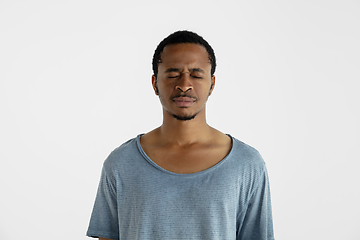 Image showing Portrait of young man isolated on white studio background