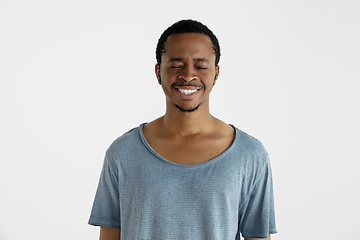 Image showing Portrait of young man isolated on white studio background