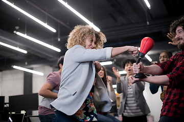 Image showing multiethnics business team boxing at office