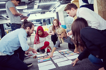 Image showing black muslim woman having meeting with Multiethnic  startup busi