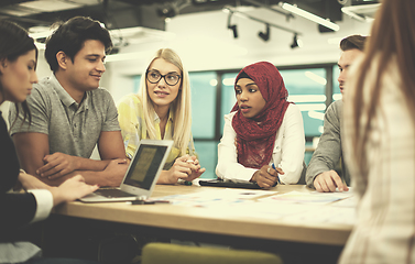 Image showing Multiethnic startup business team having meeting