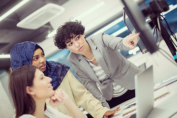 Image showing multiethnics team of software developers working together