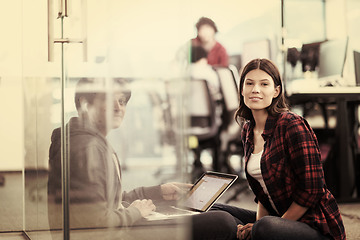 Image showing software developers couple working on the floor