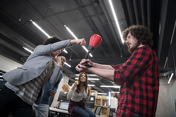 Image showing multiethnics business team boxing at office