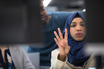 Image showing black muslim female software developer at work