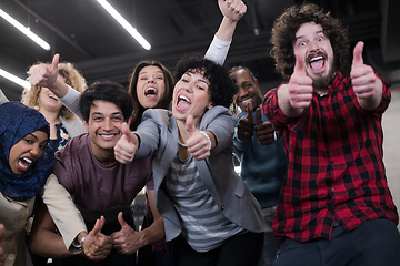 Image showing portrait of young excited multiethnics business team