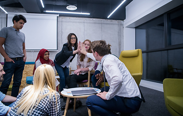 Image showing Multiethnic startup business team having meeting