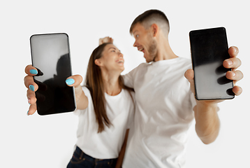 Image showing Portrait of beautiful couple isolated on white studio background