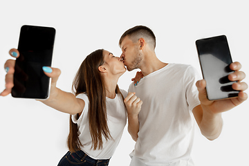 Image showing Portrait of beautiful couple isolated on white studio background