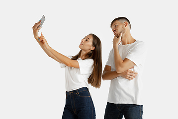 Image showing Portrait of beautiful couple isolated on white studio background