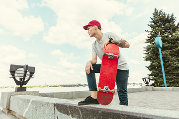 Image showing Skateboarder at the city\'s street in sunny day