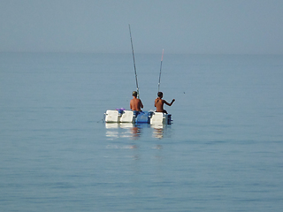 Image showing Children catch fish.