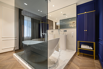 Image showing Big deluxe elegant classic bedroom with bath