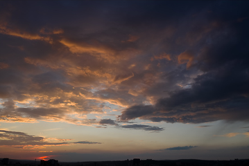 Image showing dark colored sunset with clouds