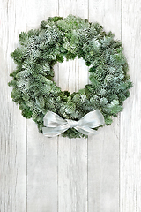 Image showing Snow Covered Spruce Fir Winter Wreath 